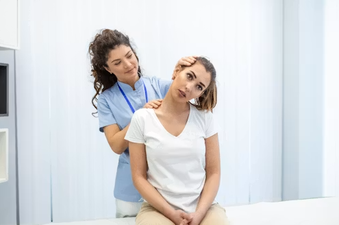 Chiropractor treating a patient for an auto injury